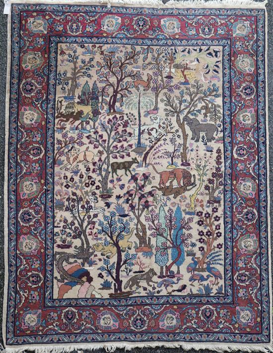 A North West Persian ivory ground rug, 6ft 3in by 4ft 10in.